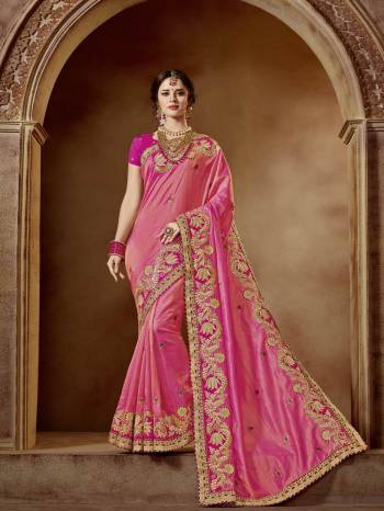 Classy, sensuous and versatile are the perfect words to describe this Dark pink color two tone viscose pattern saree. Ideal for party, festive & social gatherings. this gorgeous saree featuring a beautiful mix of designs. Its attractive color and designer embroidered design, patch design, stone, beautiful floral design work over the attire & contrast hemline adds to the look. Comes along with a contrast unstitched blouse.