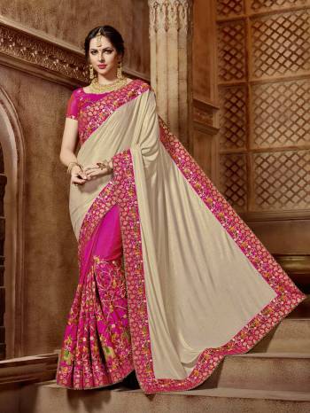 Gorgeously mesmerizing is what you will look at the next wedding gala wearing this beautiful beige and Fuschia pink color gllitter lycra and two tone silk saree. Ideal for party, festive & social gatherings. this gorgeous saree featuring a beautiful mix of designs. Its attractive color and designer embroidered design, patch design, stone, beautiful floral design work over the attire & contrast hemline adds to the look. Comes along with a contrast unstitched blouse.