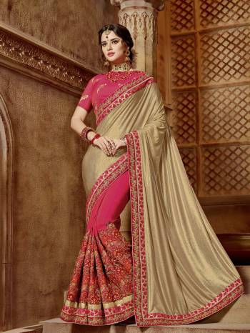 Flaunt your gorgeous look wearing this gold and Fuschia Pink color glitter lycra and two tone silk saree. Ideal for party, festive & social gatherings. this gorgeous saree featuring a beautiful mix of designs. Its attractive color and designer embroidered design, patch design, stone, beautiful floral design work over the attire & contrast hemline adds to the look. Comes along with a contrast unstitched blouse.