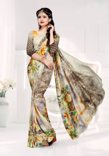 Grab This Pretty Saree In Grey And Off-White Color Paired With Grey and Off-White Colored Blouse. This Saree And Blouse Are Fabricated On Crepe Silk Beautified With Floral Prints.