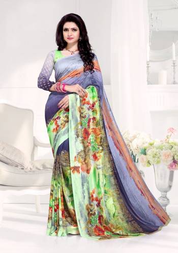 Go Colorful Wearing This Saree In Multi Color Paired With Multi Colored Blouse. This Saree And Blouse Are Fabricated On Crepe Silk Beautified With Prints All Over It. Buy Now.