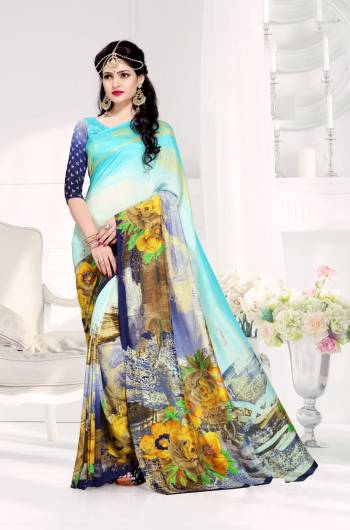 Very Pretty Saree Is Here In Blue And Multi Color Paired With Blue Colored Blouse. This Saree and Blouse Are Fabricated On Crepe Silk Beautified With Prints All Over It. Buy This Saree Now.