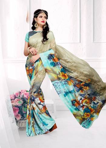 Beat The Heat This Summer With This Saree In Multi Color Paired With Blue Colored Blouse. This Saree And Blouse Are Fabricated On Crepe Silk Beautified With Floral Prints. This Saree Is Light Weight And Easy To Carry All Day Long.