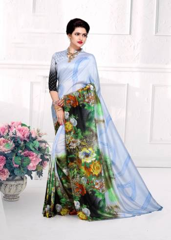 Very Pretty Saree Is Here In Ice Blue And Multi Color Paired With Ice Blue Colored Blouse. This Saree and Blouse Are Fabricated On Crepe Silk Beautified With Prints All Over It. Buy This Saree Now.