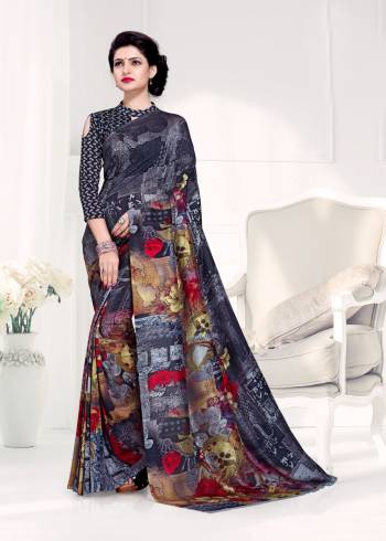 Enhance Your Beauty Wearing This Saree In Black Color Paired With Black Colored Blouse. This Saree And Blouse Are Fabricated On Crepe Silk Beautified With Prints All Over It. Buy This Saree Now.