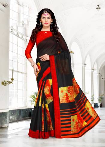 Enhance Your Beauty Wearing This Saree In Black Color Paired With Red Colored Blouse. This Saree And Blouse Are Fabricated On Chanderi Cotton Which Is Light Weight And Easy To Carry All Day Long. 