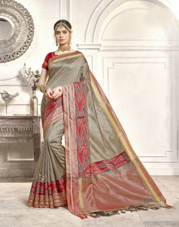 Flaunt Your Rich and Elegant Taste Wearing This Silk Saree In Grey Color Paired With Contrasting Red Colored Blouse. This Saree And Blouse Are Fabricated On Art Silk Beautified With Prints. This Saree Is Light Weight And Easy To Carry All Day Long.