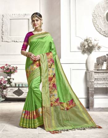 This Summer Look The Brightest Of All Wearing This Saree In Bright Green Color Paired With Contrasting Magenta Pink Colored Blouse. This Saree And Blouse are Fabricated On Art Silk Beautified With Prints. It Is Light Weight And Easy To Carry All Day Long.