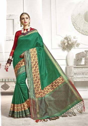 For A Proper Traditional Look, Grab This Saree Combined With Traditional Matching In Green Colored Saree Paired With Contrasting Red Colored Blouse. This Saree And Blouse Are Fabricated On Art Silk Which Is Light Weight And Easy To Carry All Day Long.