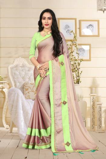 Look Very Pretty And Earn Lots Of Compliments Wearing This Designer Saree In Dusty Pink Color Paired With Contrasting Light Green Colored Blouse. This Saree Is Fabricated On Satin Silk Paired With Art Silk Fabricated Blouse. It Beautified With Hand Embroidered Patch Work. Buy Now.