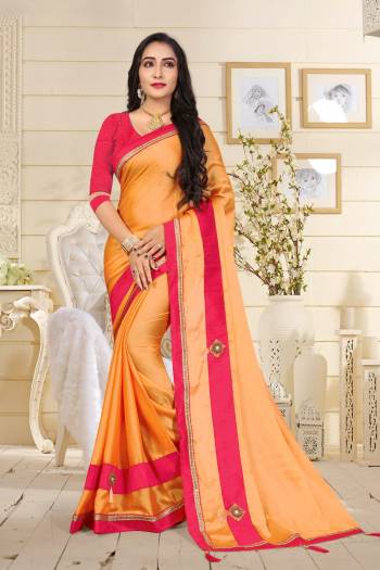 Shine Bright Wearing This Saree In Orange Color Paired With Contrasting Dark Pink Colored Blouse. This Saree Is Fabricated On Satin Silk Paired With Art Silk Fabricated Blouse. Buy This Bright And Beautiful Looking Saree Now.