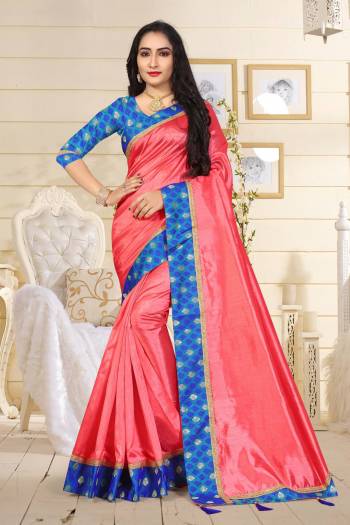 A Must Have Color In Every Womens Wardrobe Is Here With This Saree In Dark Peach Color Paired With Contrasting Blue Colored Blouse. This Saree Is Fabricated On Art Silk Paired With Jacquard Silk Fabricated Blouse. This Saree Is Light In Weight And Also Durable.