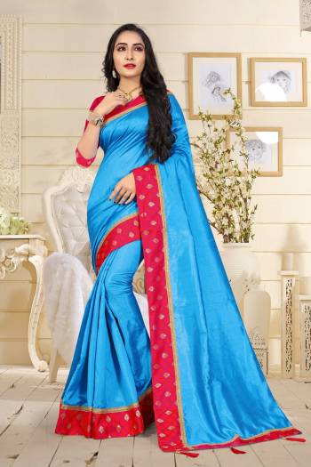 Grab This Pretty Saree In Blue Color Paired With Contrasting Dark Pink Colored Blouse. This Saree Is Fabricated On Art Silk Paired With Jacquard Silk Fabricated Blouse. Wear This At Your Festive Or Any Social Gatherings. Buy This Saree Now.