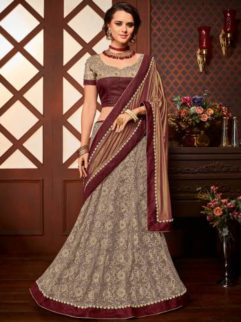 Flaunt a new ethnic look wearing this maroon and Grey color Imported coated fabrics & diamond Net fabrics with Heavy work & jacquard border saree. this party wear saree won't fail to impress everyone around you. this gorgeous saree featuring a beautiful mix of designs. Its attractive color and designer embroidered saree, moti design, stone, heavy designer blouse and beautiful floral design work over the attire & contrast hemline adds to the look. Comes along with a contrast unstitched blouse.