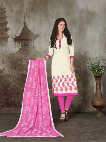 Shine Bright With This Cream Colored Suit Paired With Contratsing Pink Colored Bottom And Dupatta. This Suit Is Fabricated On Chanderi Cotton Paired With Cotton Bottom And Nazneen Dupatta.All The Fabrics Ensures Supreb Comfort All Day Long. Buy It Now.