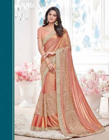 Bright And Visually Appealing, Grab This Peach Colored Saree Paired With Peach Colored Blouse. This Saree Is Made From  Lycra Paired With Brocade  Fabricated Blouse.Buy It Now