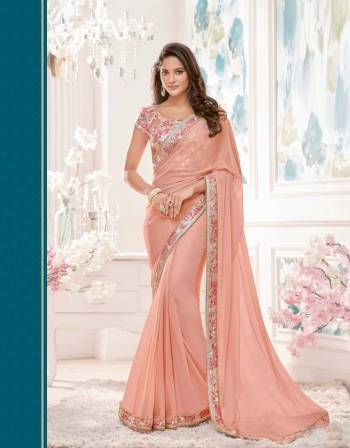 Go Colorful This Season With This Pink Colored Saree Paired With Contratsing Pink Colored Blouse. This Saree Is Fabricated On Lycra Net Paired With Brocade Fabricated Blouse.Grab This Designer Saree Now.