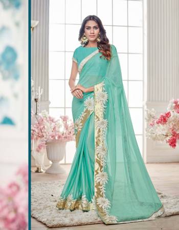 Celebrate This Season With This Aqua Blue Colored Saree Paired With Contrasting Aqua Blue Colored Blouse.This Saree Is Fabricated On Lycra Net Paired With Raw Silk Fabricated Blouse.Buy It Now. Which Is Light Weight And Keeps You Comfortable Through Out Your Festive Mood.Grab This Designer Saree Now.