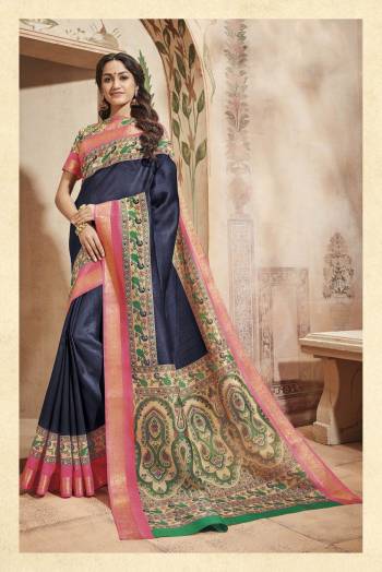 Enhance Your Personality Wearing This Saree In Blue Color Paired With Beige Colored Blouse. This Saree And Blouse Are Fabricated On Art Silk Beautified With Multi Colored Prints All Over It. It Is Easy To Drape And Carry All Day Long.