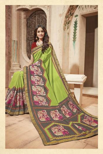 Go Traditional Wearing This Saree In Light Green Color Paired With Contrasting Red Colored Blouse. This Saree And Blouse Are Fabricated On Art Silk Beautified With Prints All Over It. Buy This Saree Now.