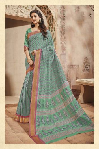 Add This Pretty Shade In Green With This Saree In Sea Green Color Paired With Sea Green Colored Blouse. This Saree and Blouse Are Fabricated On Art Silk Beautified With Prints All Over It. Buy This Saree For Your Casual Or Semi- Casual wear.