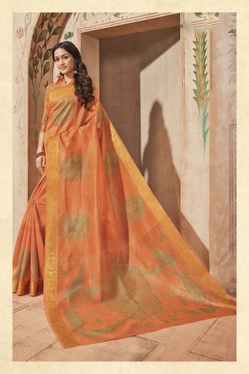 Orange Color Induces Perfect Summery Appeal To Any Outfit, So Grab This Saree In Orange Color Paired With Orange Colored Blouse. This Saree And Blouse Are Fabricated On Art Silk Beautified With Bold Prints. Buy This Saree Now.