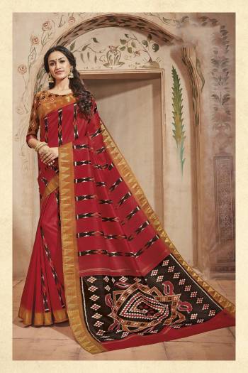 Adorn The Angelic Look Wearing This Saree In Red Color Paired With Contrasting Rust Orange Colored Blouse. This Saree And Blouse Are Fabricated On Art Silk Beautified With Prints Over It. Buy This Saree Now.