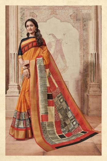 Orange Color Induces Perfect Summery Appeal To Any Outfit, So Grab This Saree In Orange Color Paired With Black Colored Blouse. This Saree And Blouse Are Fabricated On Art Silk Beautified With Bold Prints. Buy This Saree Now.