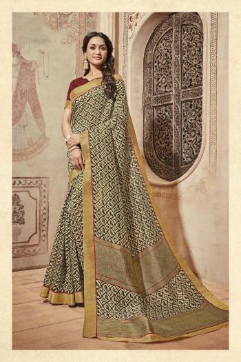 Simple And Elegant Looking Saree Is Here In Beige Color Paired With Contrasting Maroon Colored Blouse. This Saree And Blouse Are Fabricated On Art Silk Which Is Light Weight And Easy To Carry All Day Long.