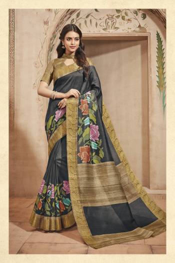 Enhance Your Beauty Wearing This Saree In Black Color Paired With Beige Colored Blouse. This Saree And Blouse Are Fabricated On Art Silk Beautified With Unique Prints. Buy This Saree Now.