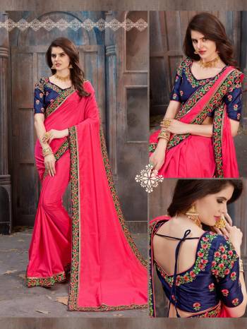 Shine Bright In This Attractive Colored Saree In Dark Pink Color Paired With Contrasting Royal Blue Colored Blouse. This Saree Is Fabricated On Satin Silk Paired With Art Silk Fabricated Blouse. It Is Beautified With Contrasting Colored Embroidery Over The Blouse And Saree Lace Border.