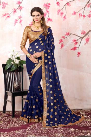 For An Elegant Personality, Grab This Saree In Blue Color Paired With Golden Colored Blouse. This Saree Is Fabricated On Georgette Paired With Brocade Fabricated Blouse. It Is Light Weight And Ensures Superb Comfort All Day Long. 