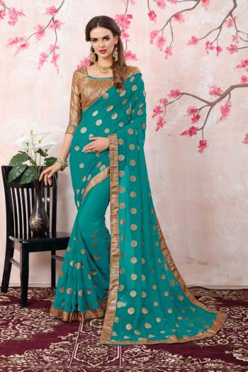 New Shade In Blue Is Here With This Saree In Turquoise Blue Color Paired With Golden Colored Blouse. This Saree Is Fabricated On Georgette Paired With Brocade Fabricated Blouse. It Is Light Weight And Easy To Carry All Day Long.