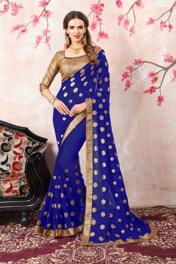 Shine Bright Wearing This Saree In Royal Blue Color Paired With Golden Colored Blouse. This Saree Is Fabricated On Georgette Paired With Brocade Fabricated Blouse. This Saree Is Light Weight And Easy To Carry All Day Long. 