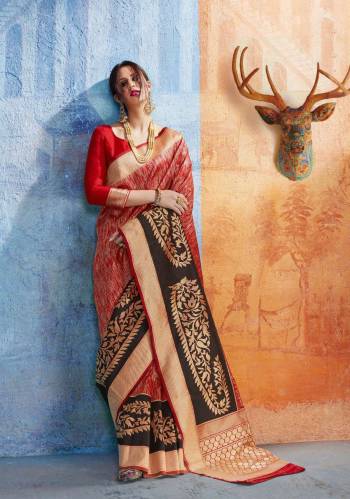 All Time Favourite Combination Is Here With This Saree In Red And Black Color Paired With Red Colored Blouse. This Saree Is Fabricated On Handloom Art Silk Paired With Art Silk Fabricated Blouse Beautified With Weave All Over It, Buy This Saree Now.