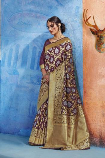 Add This Pretty Saree In Wine Color Paired With Wine Colored Blouse. This Saree Is Fabricated On Handloom Art Silk Paired With Art Silk Fabricated Blouse. This Saree Is Beautified With Weave All Over It. Buy Now.