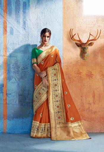 Orange Color Induces Perfect Summery Appeal To Any Outfit, So Grab This Traditonal Wear Saree In Orange Color Paired With Art Silk Fabricated Blouse. Its Fabric Gives A Rich Look To Your Personality Beautified With Weave.