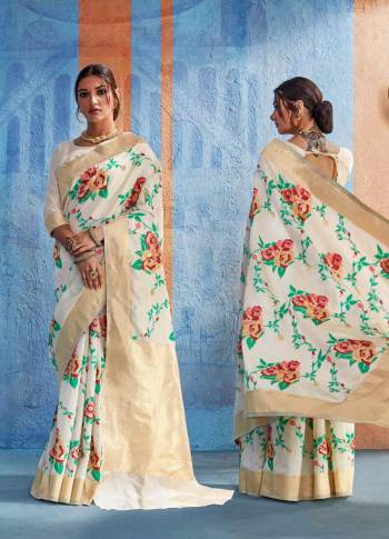 Simple And Elegant Looking Saree Is Here In White Color Paired With White Colored Blouse. This Saree Is Fabricated On Handloom Art Silk Paired With Art Silk Fabricated Blouse. It Is Beautified With Multi Colored Floral Weave All Over.