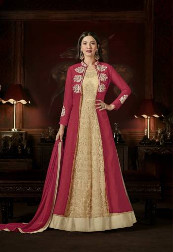 Grab This Beautiful Designer Indo-Western Suit In Dark Pink And Beige Color With Jacket Pattern. Its Top Is In Dark Pink And Beige Color Paired With Beige Colored Bottom And Dark Pink Colored Dupatta. Its Top Is Fabricated On Georgette Paired With Santoon Bottom And Chiffon Dupatta. Its Has Heavy Embroidery All Over The Top And Jacket. Buy Now.