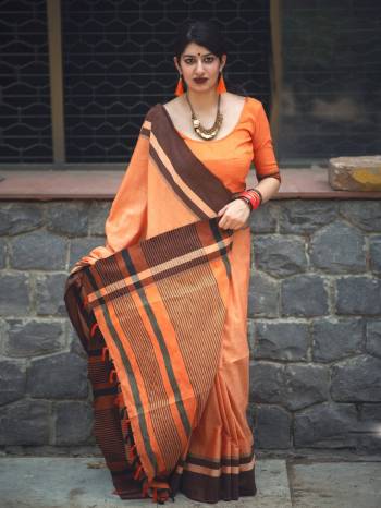 Celebrate This Festive Season Looking Elegant And Enjoy With Comfort. Grab This Attractive Saree In Orange Color Paired With Orange Colored Blouse. This Saree And Blouse Are Fabricated On Slub Cotton Which Is Light Weight and Easy To Carry All Day Long.