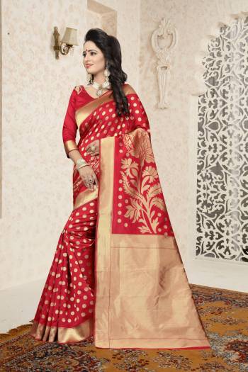 Adorn The Angelic Look, Wearing This Saree In Red Color Paired With Red Colored Blouse. This Saree And Blouse are Fabricated On Banarasi Art Silk Beautified With Rapier Jacquard Work In Bold Designs. Buy This Saree Now.