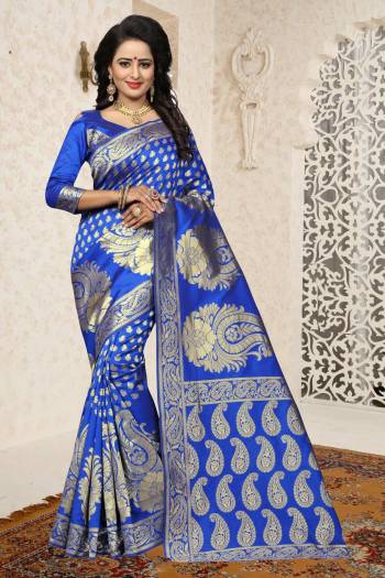 Shine Bright Wearing This Saree In Bright Royal Blue Color Paired With Royal Blue Colored Blouse. This Saree And Blouse Are Fabricated On Banarasi Art Silk Beautified With Rapier Jacquard Work. This Saree Is Light Weight And Easy To Carry All Day Long.