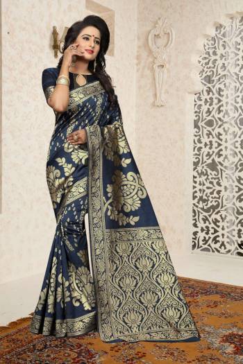 You Will Definitely Earn Lots Of Compliments Wearing This Saree In Navy Blue Color Paired With Navy Blue Colored Blouse. This Saree And Blouse Are Fabricated On Banarasi Art Silk Beautified With Rapier Jacquard Work. Buy This Rich Looking Saree Now.