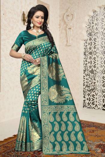 New And Unique Shade In Blue Is Here With This Saree In Teal Blue Color Paired With Teal Blue Colored Blouse. This Saree And Blouse Are Fabricated On Banarasi Art Silk Beautified With Rapier Jacquard Work. Buy This Pretty Saree Now.