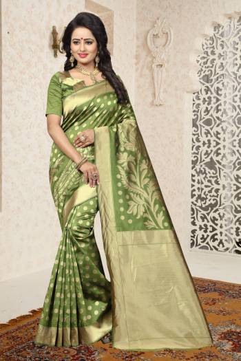 Flaunt Your Rich And Elegant Taste Wearing This Saree In Light Green Color Paired With Light Green Colored Blouse. This Saree And Blouse Are Fabricated On Banarasi Art Silk Beautified With Rapier Jacqurad Work In Bold designs. Buy This Saree Now.