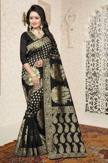 Enhance Your Beauty Wearing This Saree In Black Color Paired With Black Colored Blouse. This Saree And Blouse Are Fabricated On Banarasi Art Silk Beautified With Rapier Jacquard Work. It Is Light Weight And Easy To Carry All Day Long.