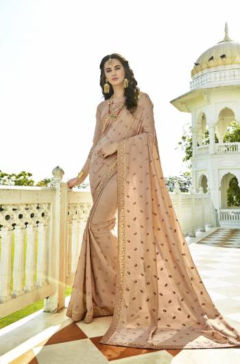 Flaunt Your Rich and Elegant Taste Wearing This Saree In Beige Color Paired With Beige Colored Blouse. This Saree And Blouse Are Fabricated On Soft Silk Beautified With Minimum Thread Work.