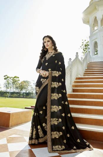 Enhance Your Beauty Wearing This Saree In Black Color Paired With Black Colored Blouse. This Saree And Blouse Are Fabricated On Soft Silk Beautified With Jari Embroidery And Stone Work. Buy This Designer Saree And Earn Lots Of Compliments From Onlookers. 