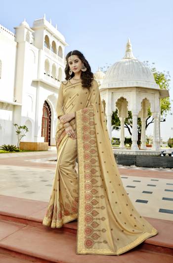 Flaunt Your Rich and Elegant Taste Wearing This Saree In Beige Color Paired With Beige Colored Blouse. This Saree And Blouse Are Fabricated On Soft Silk Beautified With Minimum Thread Work.