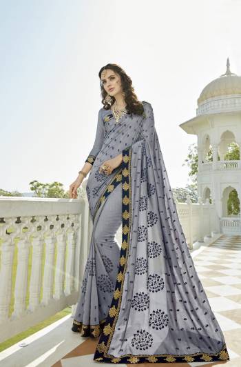 Elegant And Rich Looking Saree Is Here In Grey Color Paired With Grey Colored Blouse. This Saree And Blouse Are Fabircated On Soft Silk Beautified With Contrasting Thread Work. Buy This Saree Now.